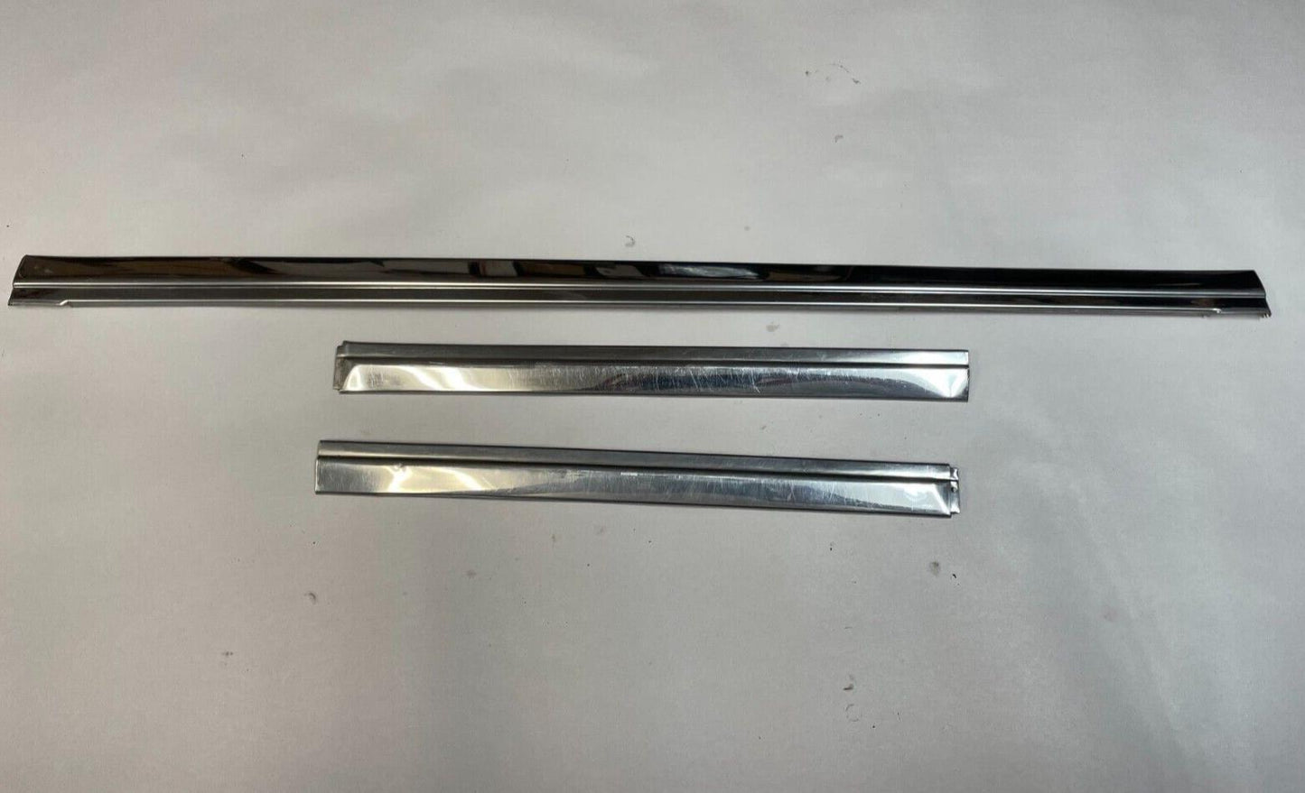 Full size Jeep Wagoneer Cherokee chrome passenger rear door window trim
