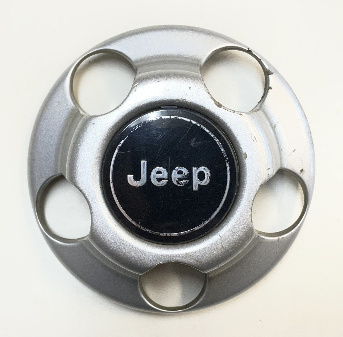 Jeep YJ TJ factory wheel center cap 52057619  silver grey 52057618