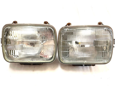 Jeep YJ Wrangler headlight buckets with chome retainer / bulbs 87-95 adjuster