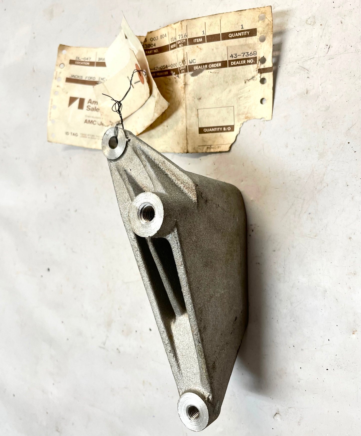 Jeep XJ idler pulley bracket fits 87-90 with no power steering 53003804